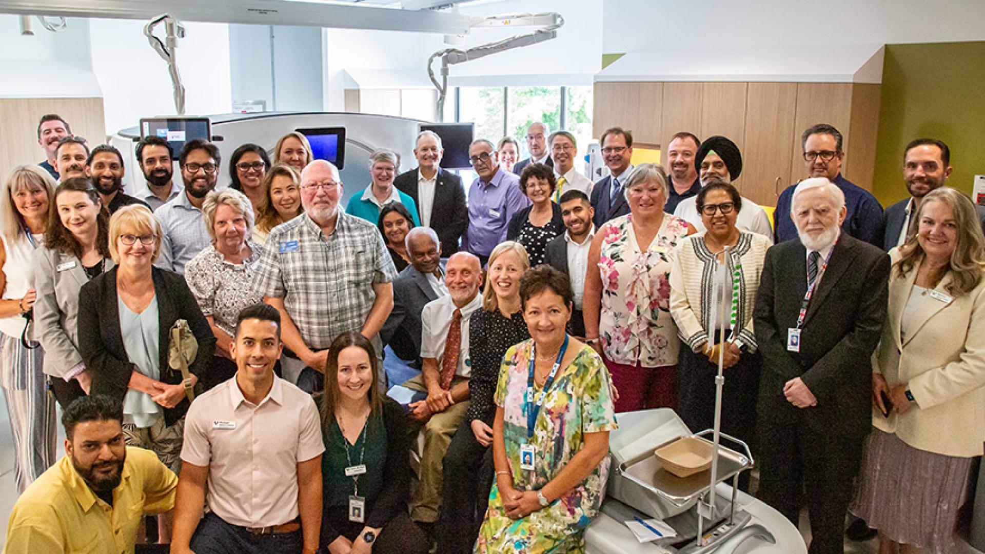 Members of the community celebrating the CT scanner installation at Mission Memorial Hospital