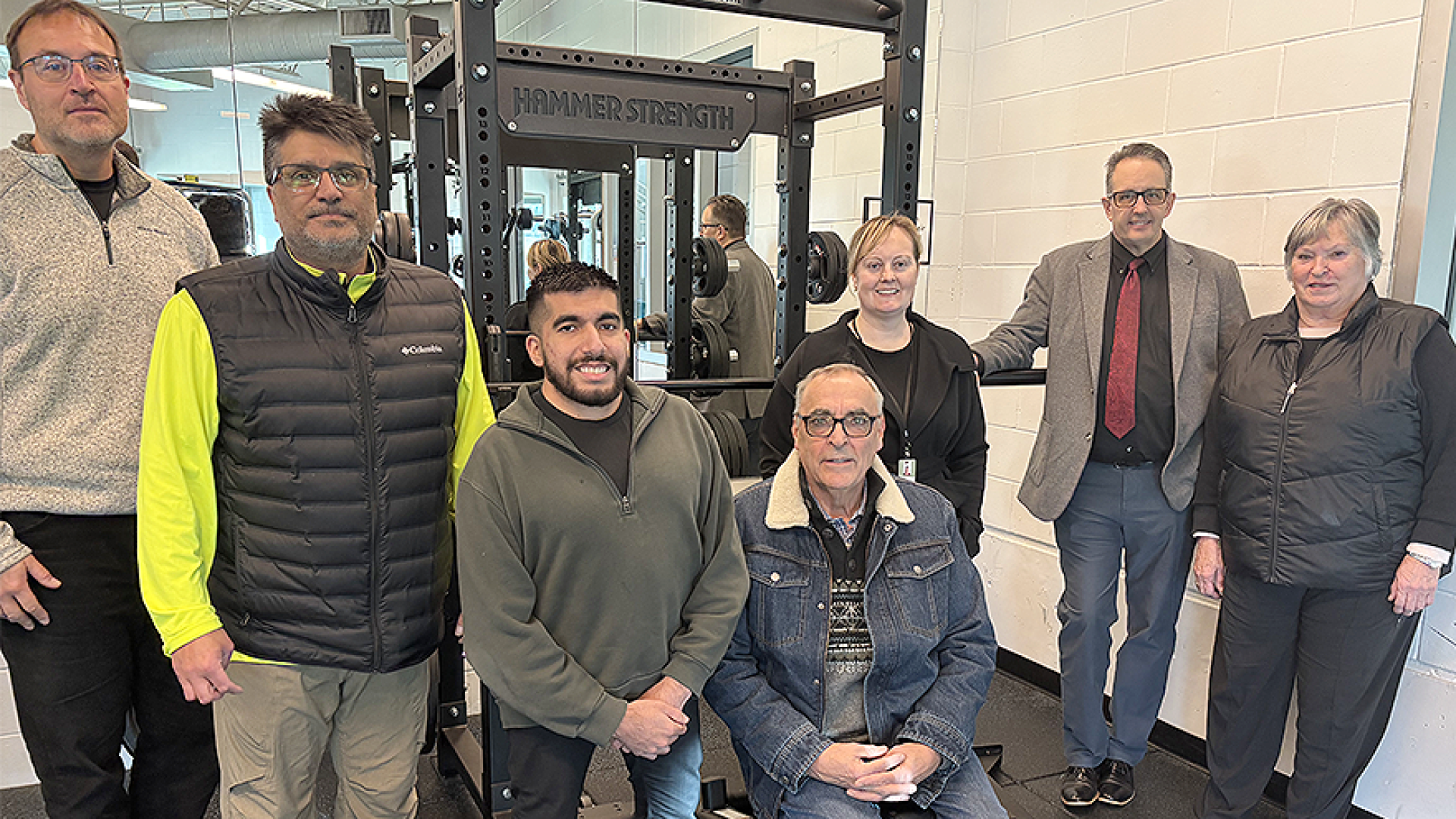 Members of Council visiting the renovated weight room.