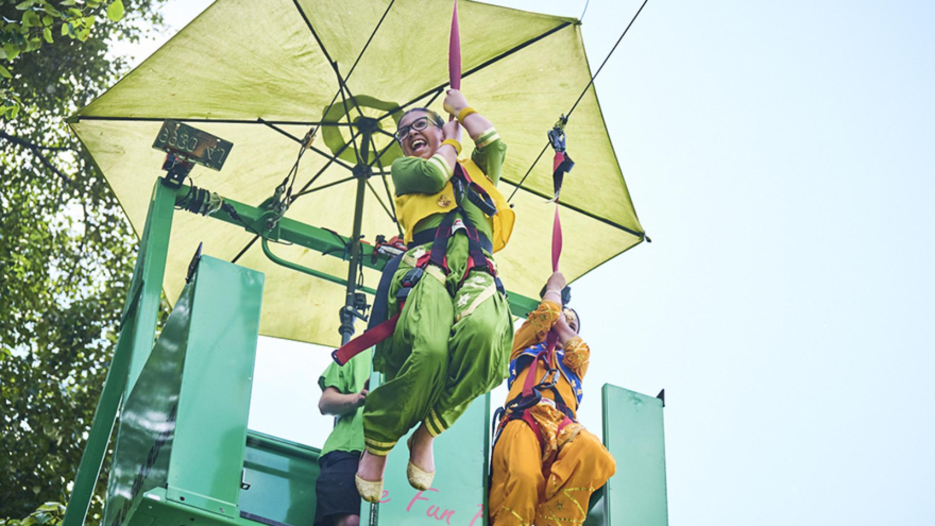 Residents enjoying a zipline