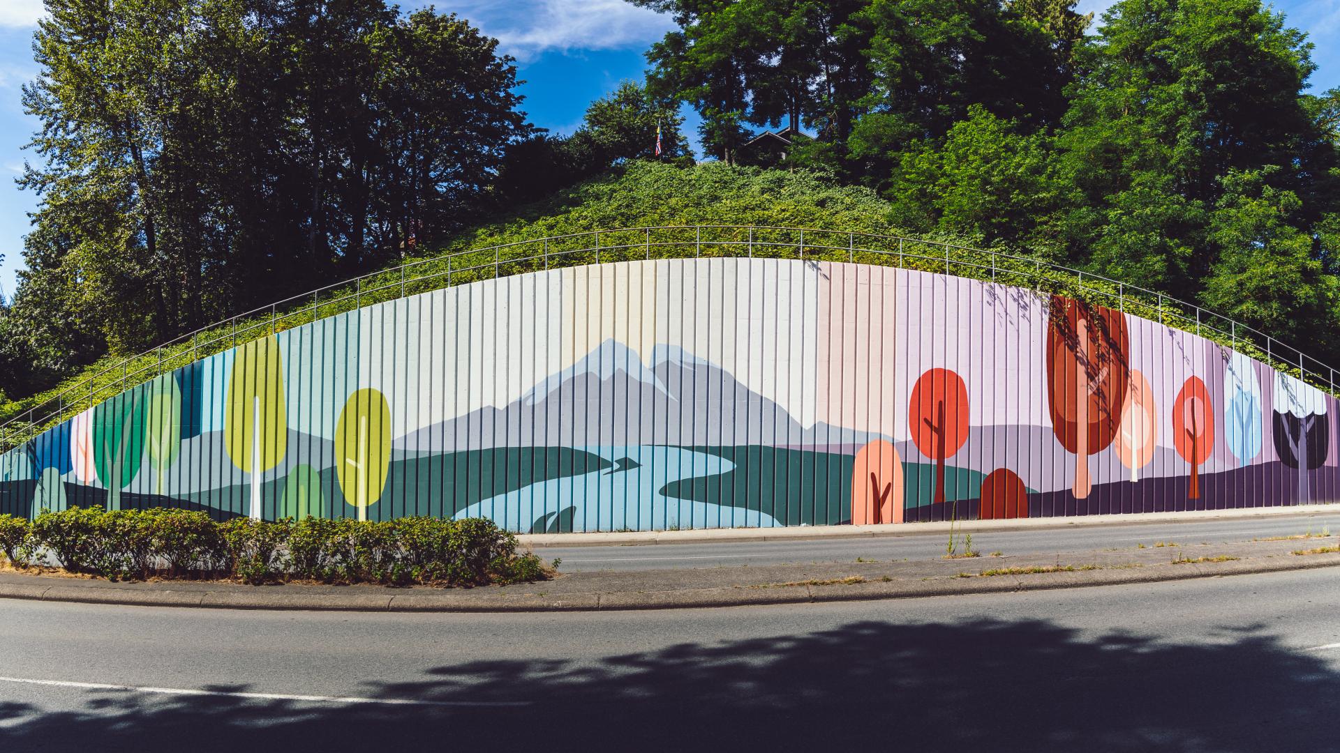 Image of a mural painted on a retaining wall