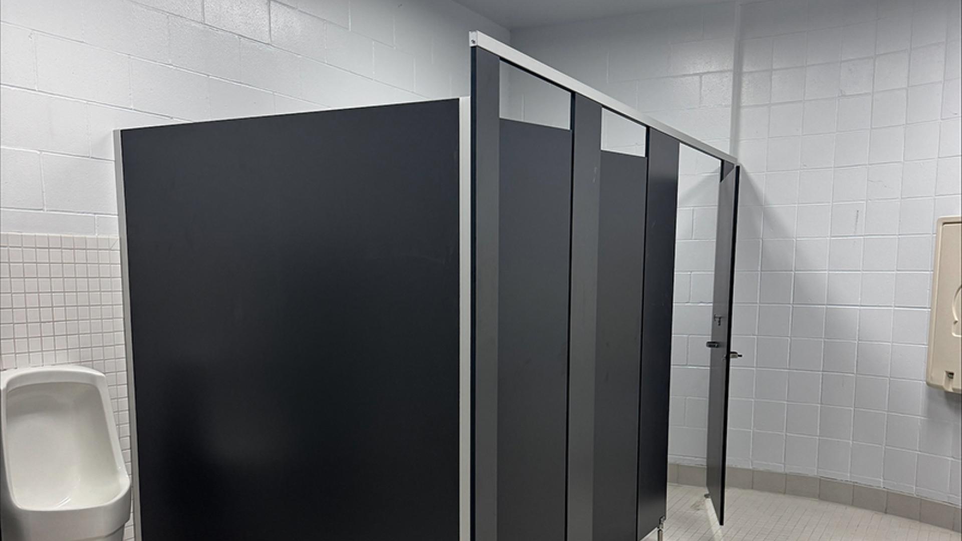 New bathroom partitions in men's changeroom