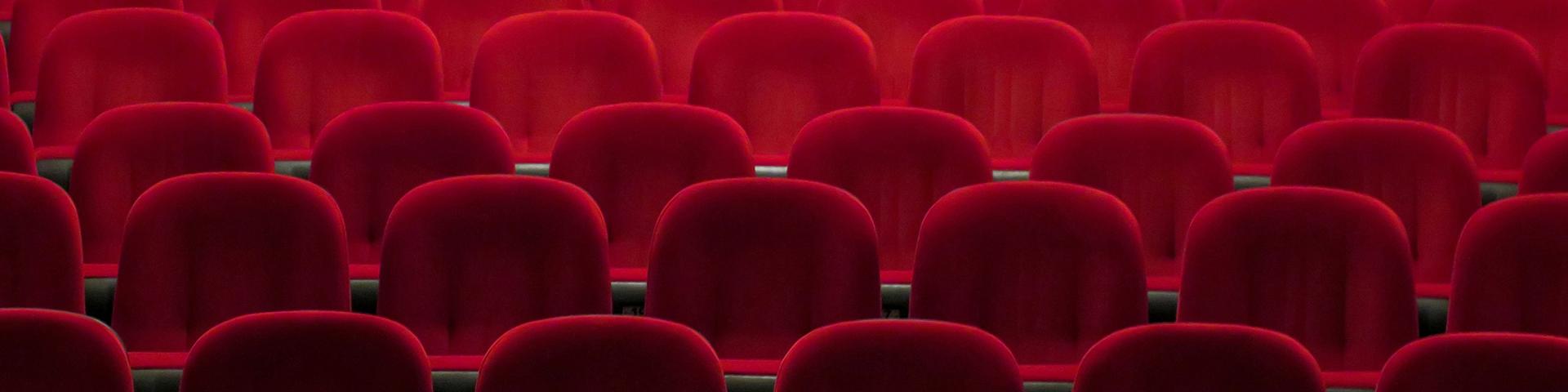 Rows of red theatre seats