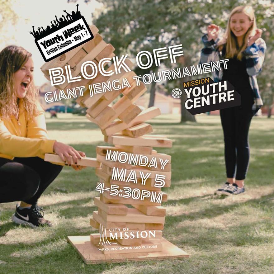 Happy young girl and woman playing giant jenga that is going to topple over